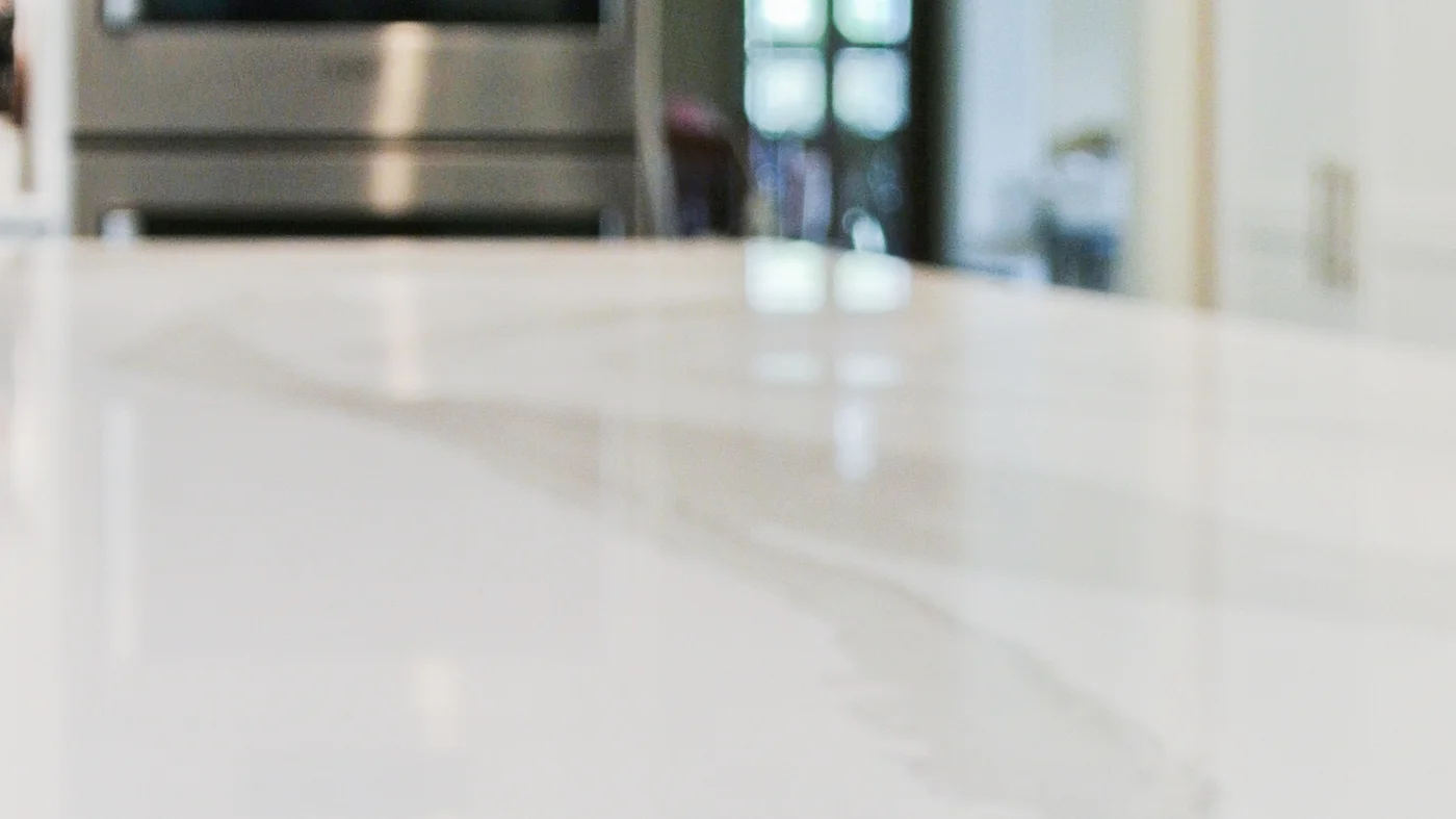 A white countertop with gray details